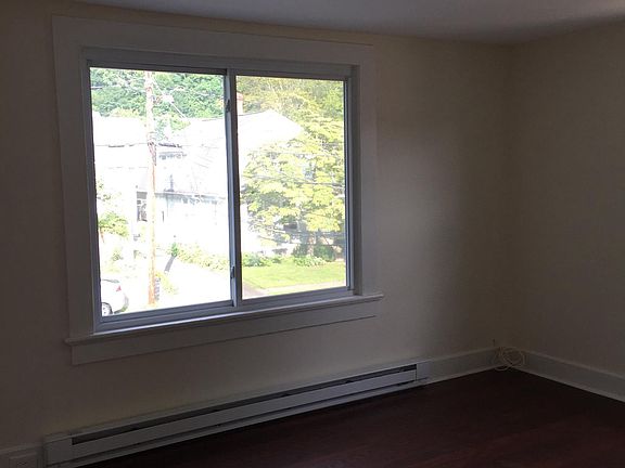 living room with large bright windows