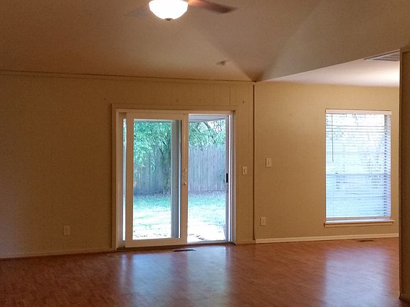 Living room & dining room sliding glass door to backyard