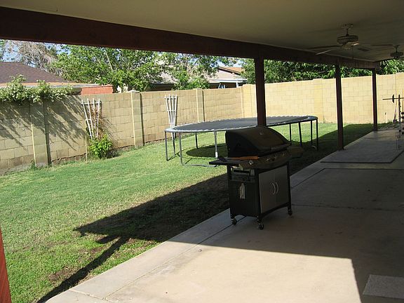 LARGE BACKYARD W/ HUGE COVERED PATIO