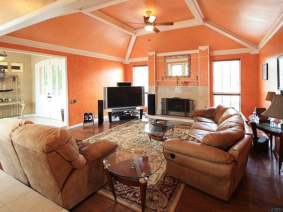 Features include recessed ceilings with crown molding
