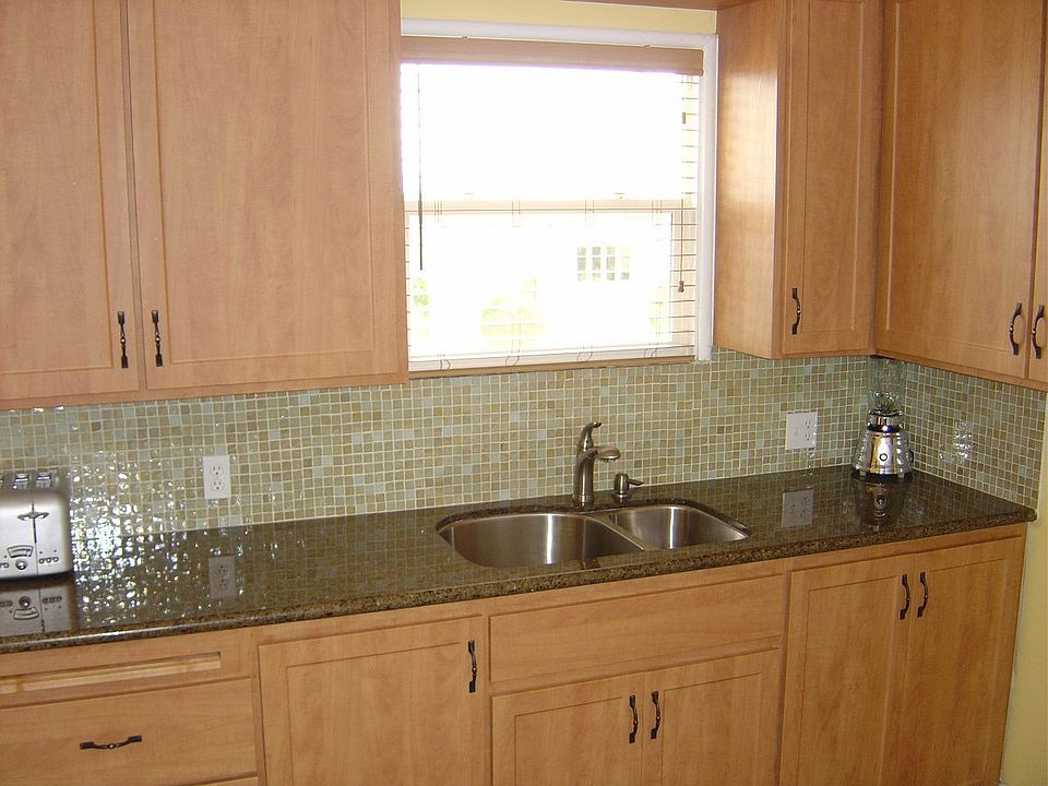 Glass Tile Backsplash and Refinished cabinets