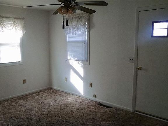 Cozy Living Room with Dish TV installed and provided
