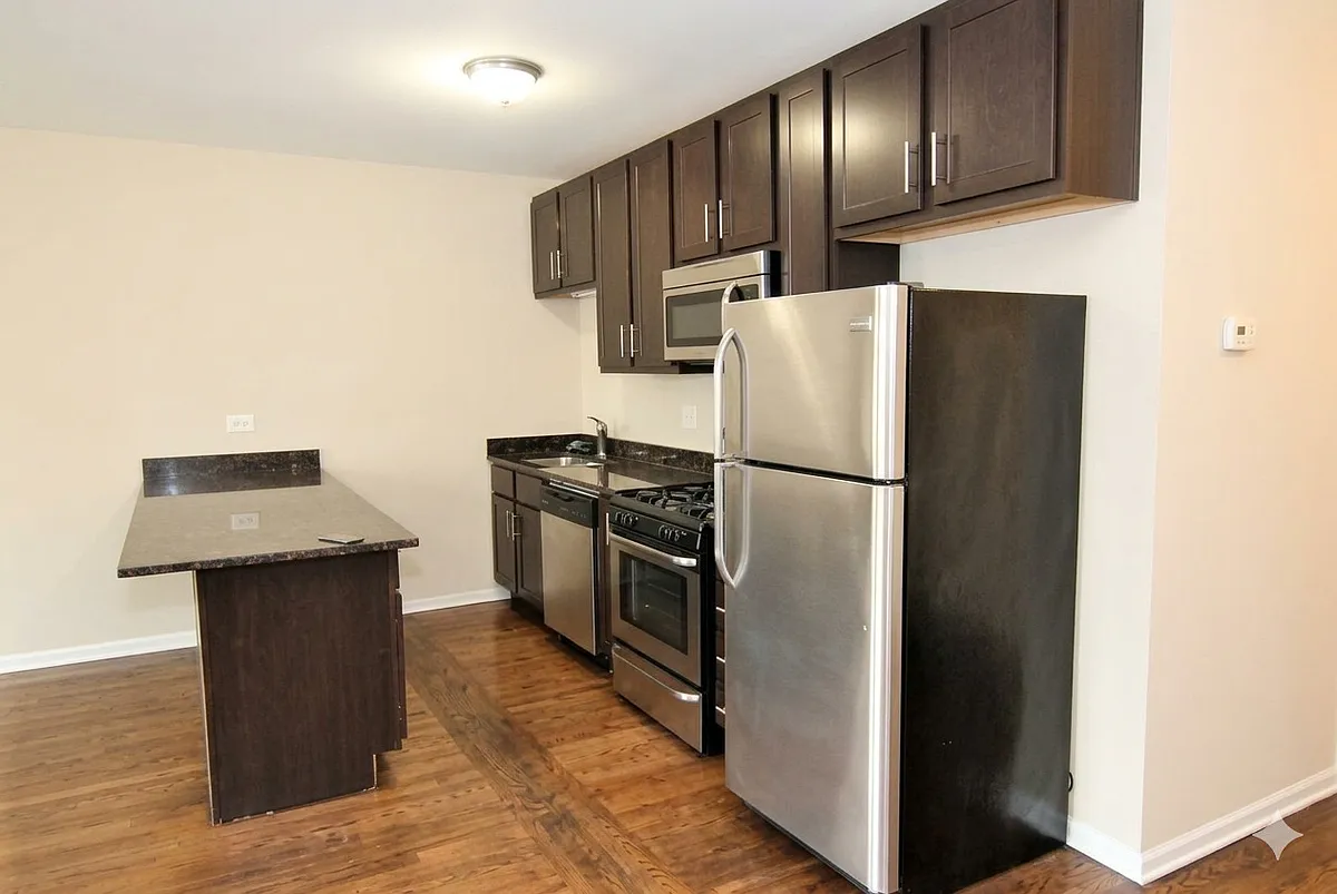 Building Photo - 2065 W Jarvis Ave #2