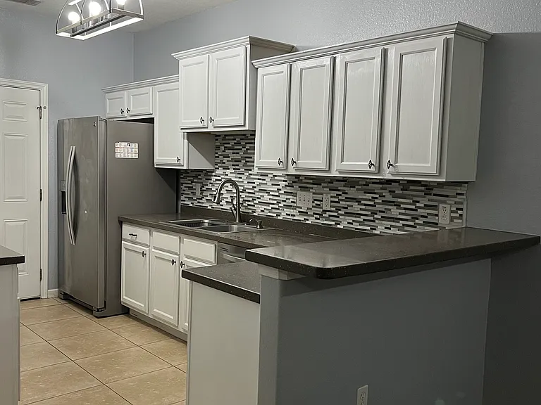 KITCHEN AND BAR AREA