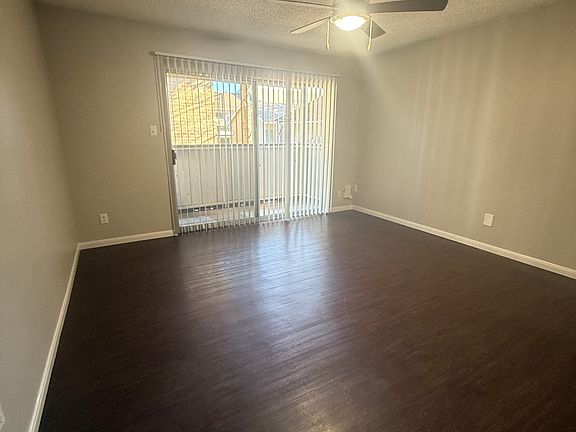 Living room facing private patio, lots of natural light