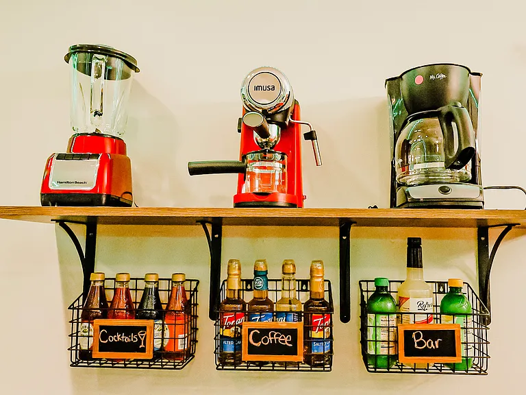 A kitchen equipped with high-quality coffee makers, ready to craft the perfect cup of coffee for a delightful start to the day.