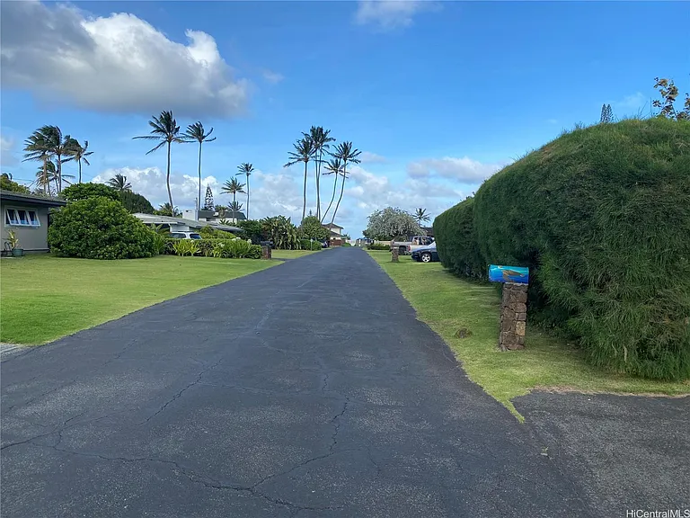 Wonderful quiet beachside street with private beach access.