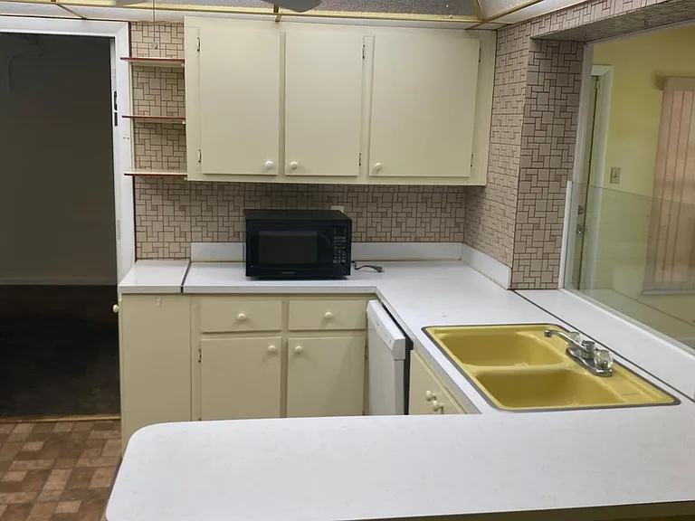 7195 NW 9th Ct — Photo 14