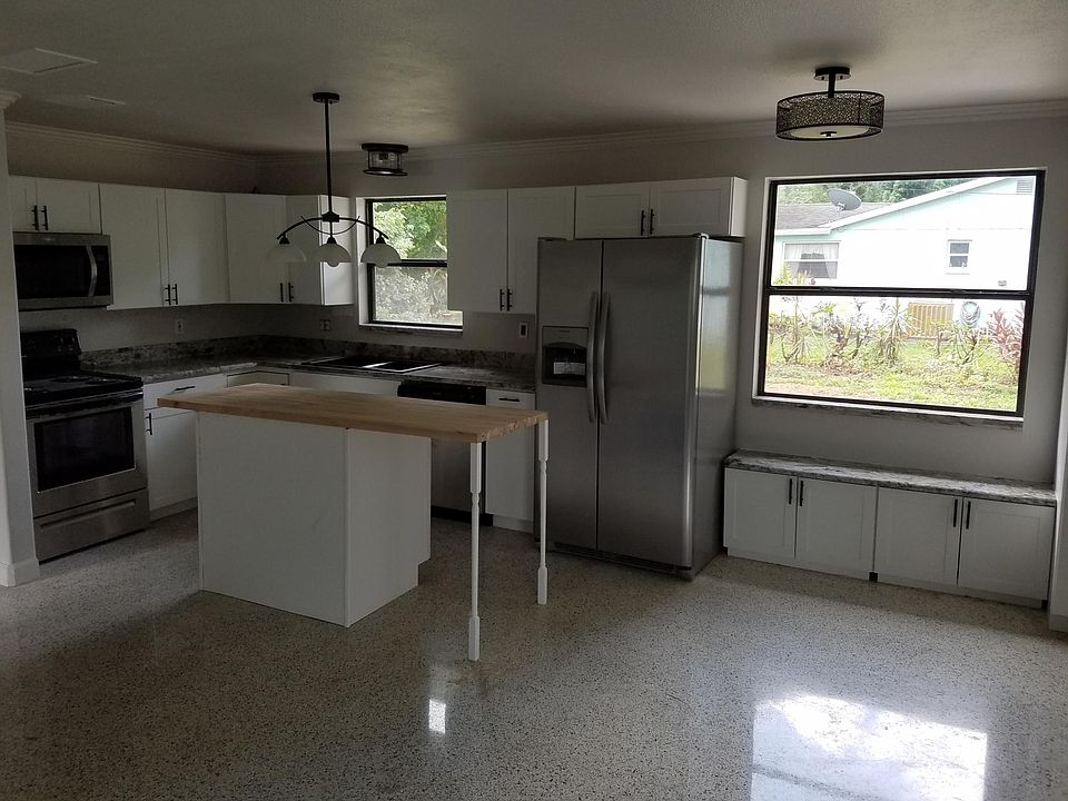 New cabinets , appliances, granite and window seat.