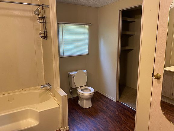 Master bath has access to walk in closet