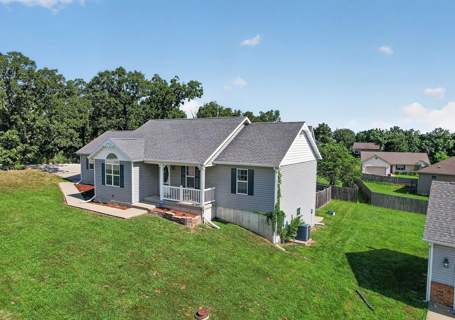 4 Bedroom Home with a Fenced in Backyard! — Photo 2