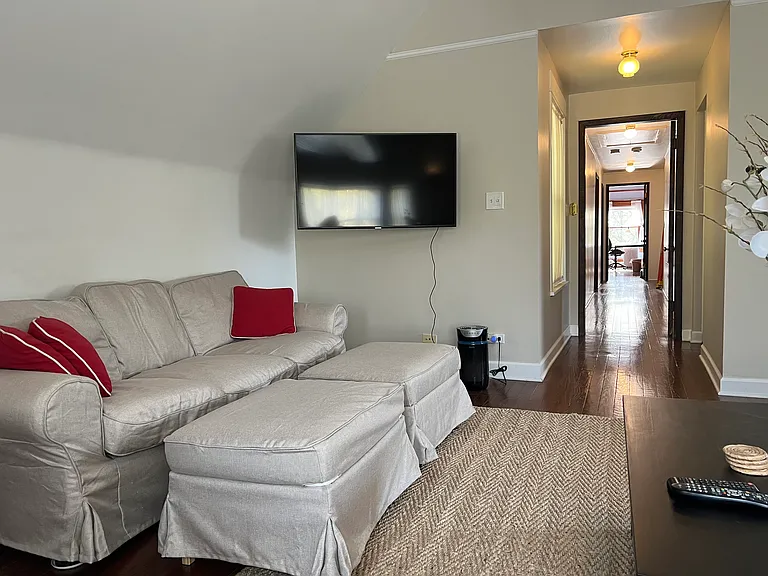 Living Room view shows long corridor hallways; there is a door separating living area which can be nice if you need to separate noise from the rest of the apartment