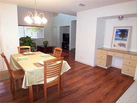 Lovely dining area is adjacent to the living room.