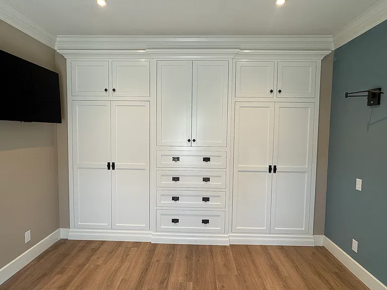 Bedroom wall of closets