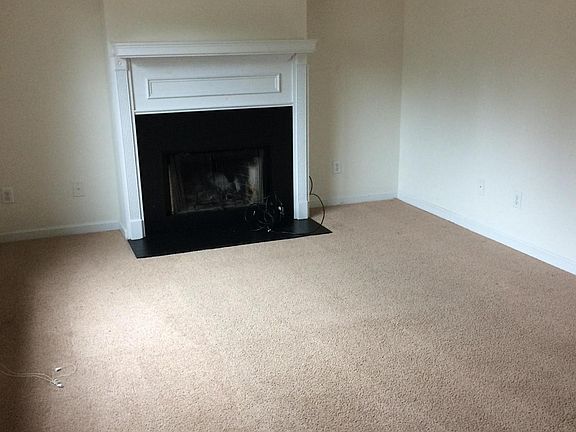 Living room NOTICE: carpet has been replaced with laminate wood floors
