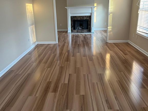 Master Bedroom with sitting area and fireplace.