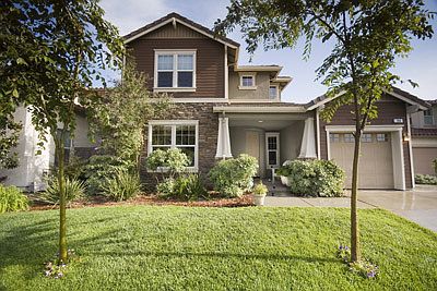 Front yard from the street. Mature planting and trees.
Attached 2 Car plus bonus garage.