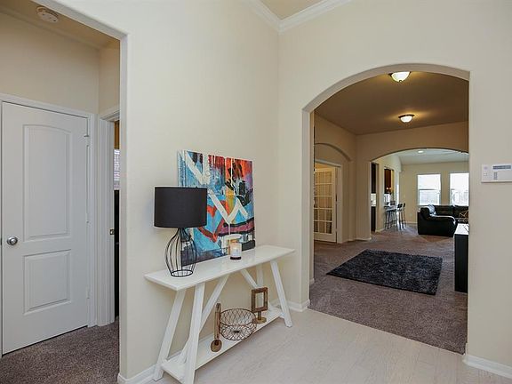 Secondary bedrooms off the front entry