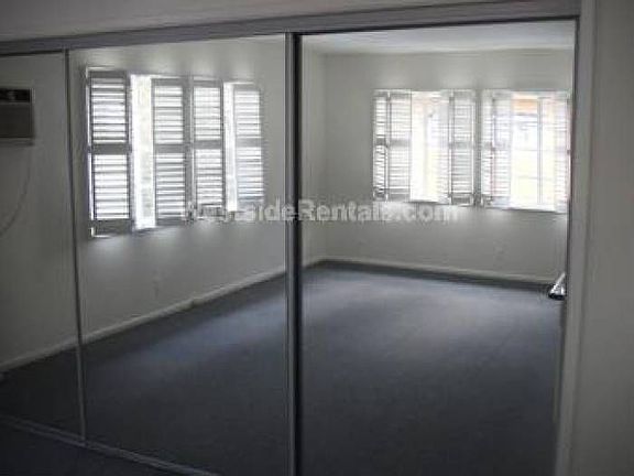 mirrored wall of wardrobe