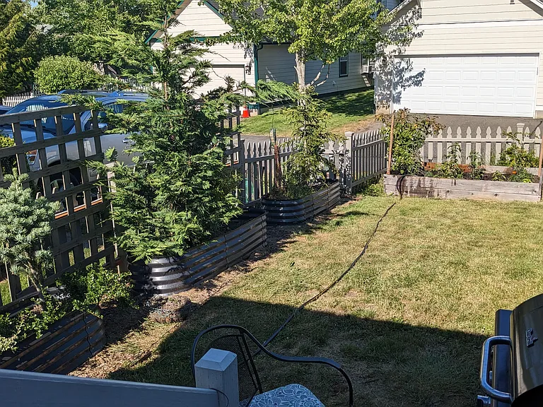 Back Yard. 2 Car Garage Access in Alley.
