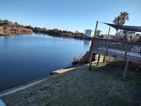 Lake front yard with Gulf view