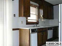 Refrigerator and washer/dryer are included.