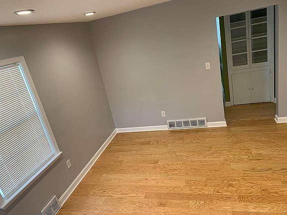 Built-in storage between living room and kitchen