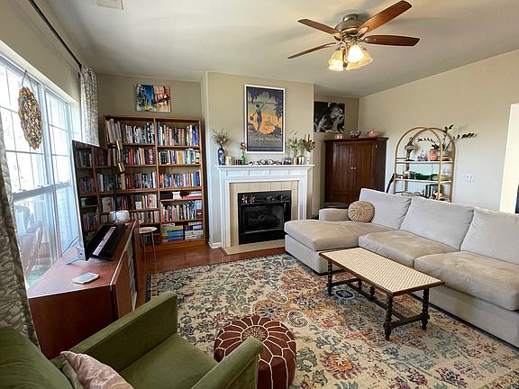 Light filled living room with a gas fire place