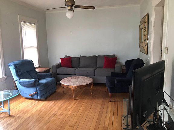 View of the living room with optional furnishings.