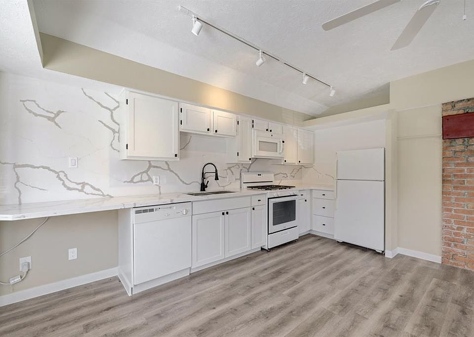 Well-appointed kitchen with updated features including a dish washer