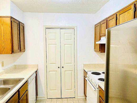 Kitchen with entrance to laundary room