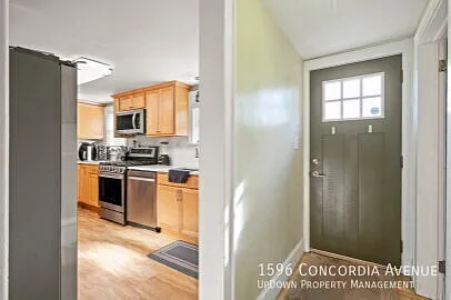 "Charming 4-Bedroom Home on Concordia Ave with 2 Full Baths & 1530 Sq Ft in Saint Paul!" — Photo 2