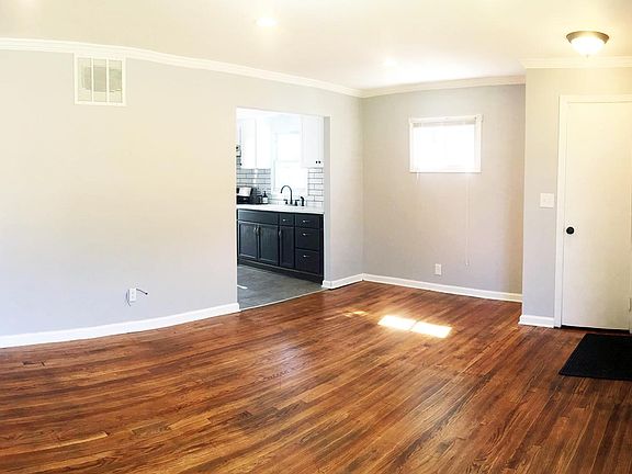 Refinished Hardwood Throughout