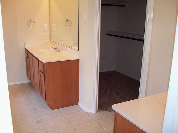 His and her vanities in master bath