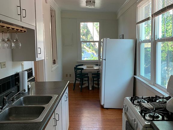 Kitchen (stove has since been replaced/updated) to black/stainless steel.