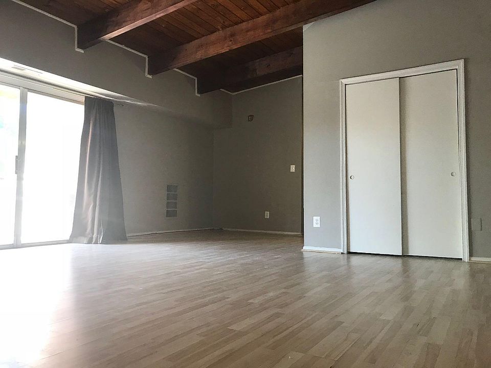 Living / dining room with access to balcony