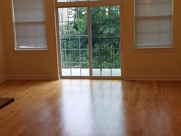 Wood Floor throughout, Sliding glass doors and a baclony!