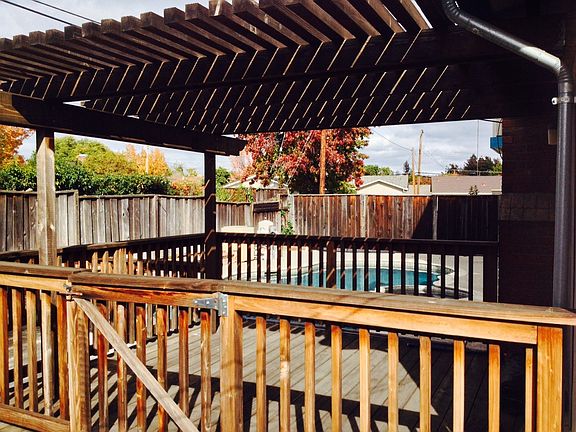 deck and arbor in backyard, lock from outside for children's