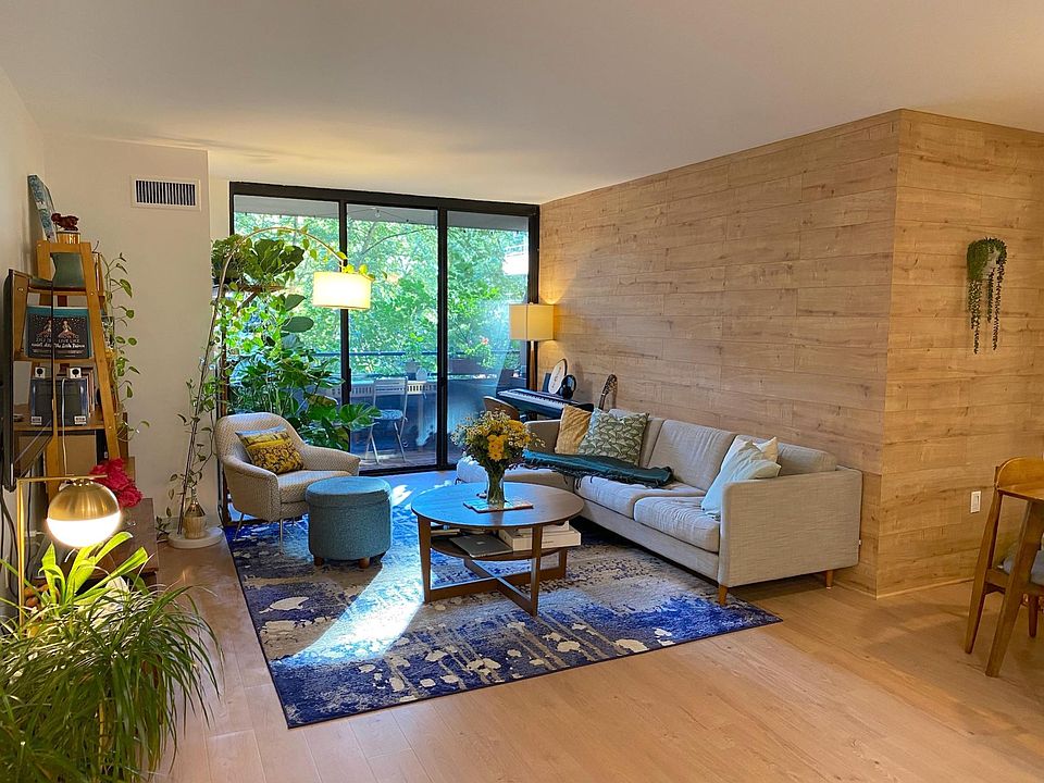 Living room with floor to ceiling windows