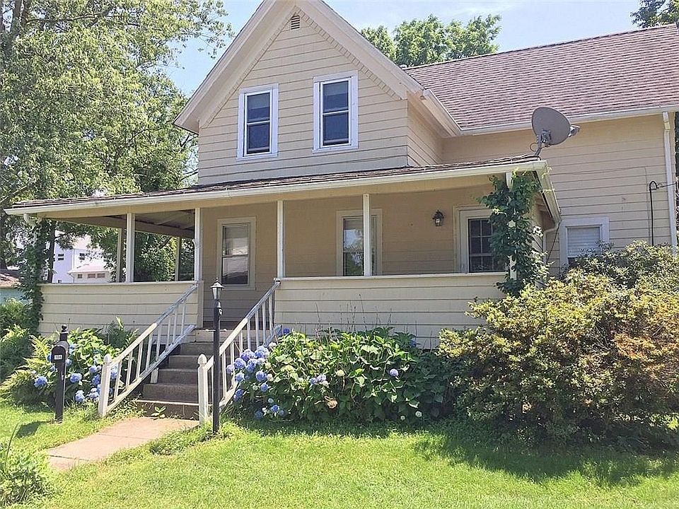 Victorian style Colonial with wraparound porch