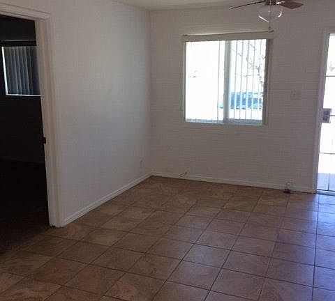 Living room and door to bedroom