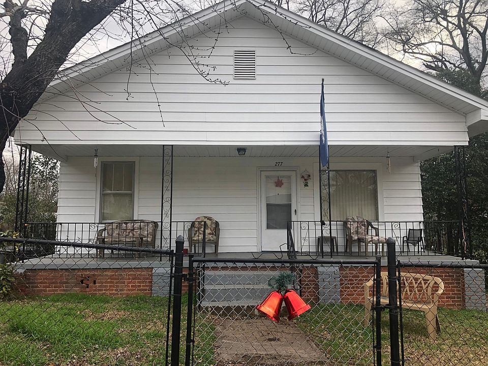 Street view showing large covered front porch