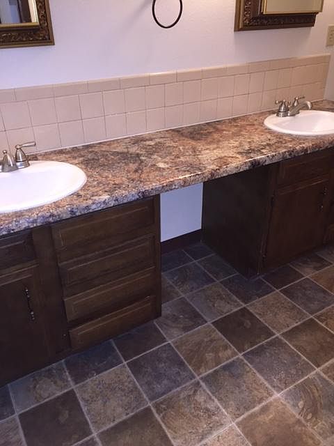 Double sink vanity in bathroom