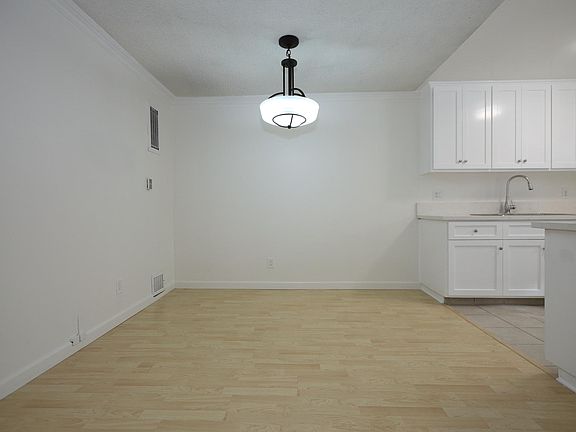 Dining area and entry to kitchen.