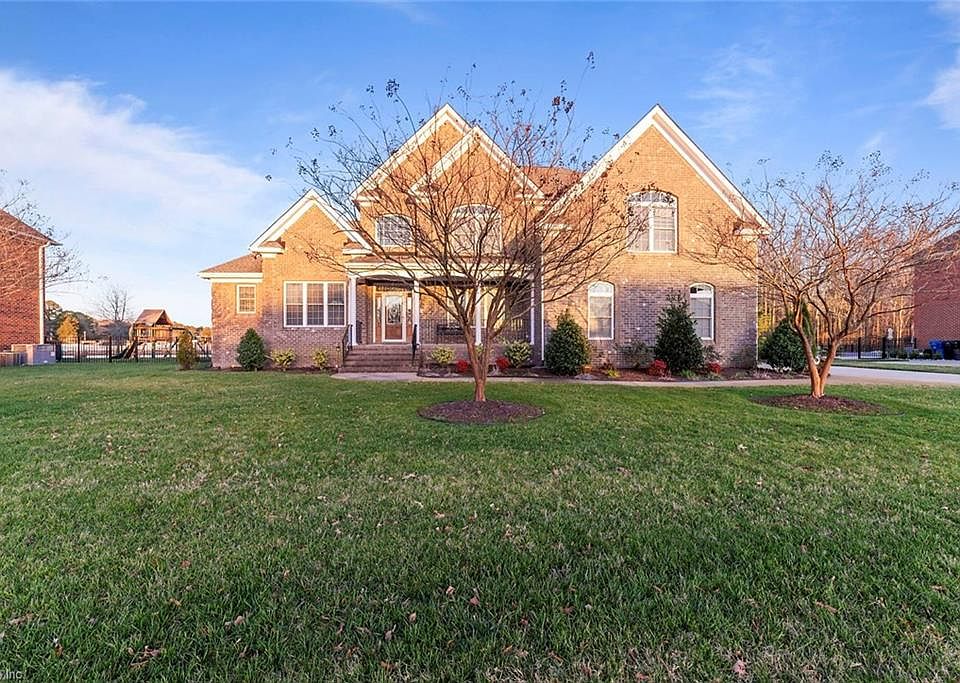 Welcome to 1749 Champion Circle in Heritage Park.This is a custom all brick home .