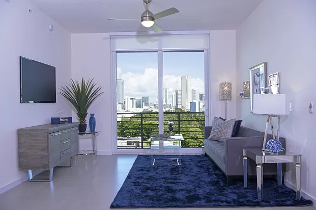 2 Bedroom Model Unit | Spacious Living Room with Private Balcony