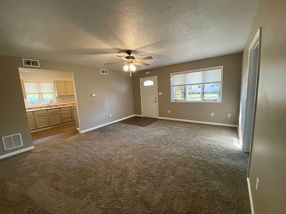 Living room looking South towards front door.