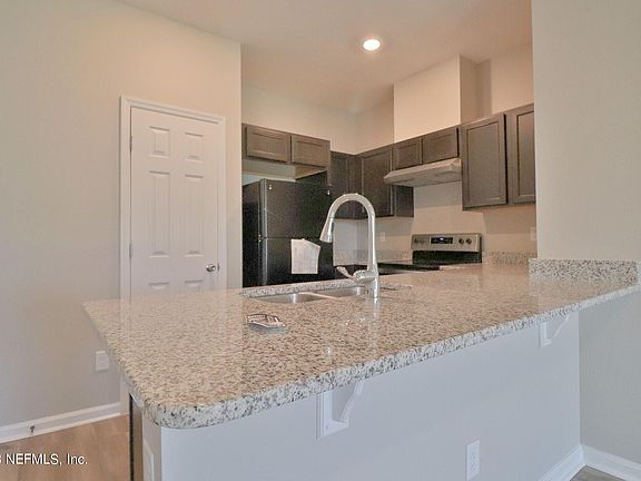4th image of 9799 Fiddleback Ln