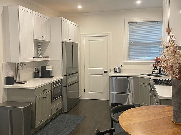 Kitchen connects to laundry room
