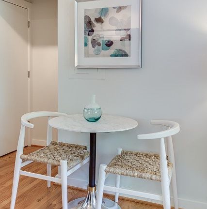 Marble topped bistro table seats 2